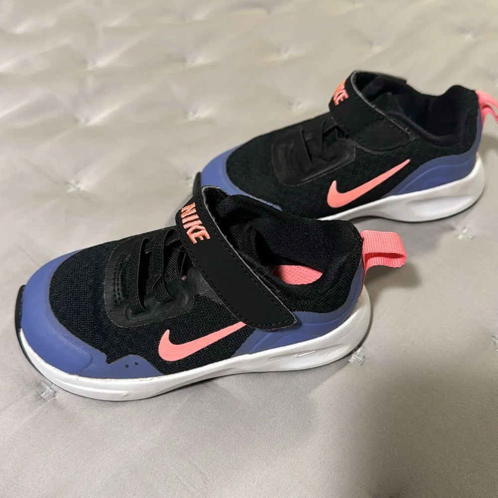 Toddler purple, pink and black Nike Downshifter sneakers size 8